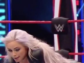 WWE - Liv Morgan on her knees in the ring