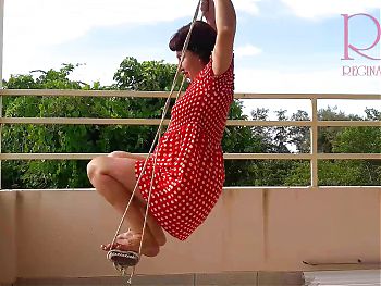 Depraved housewife swinging without panties on a swing c1